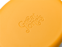 Enameled cast-iron Dutch oven in mustard yellow - logo close-up