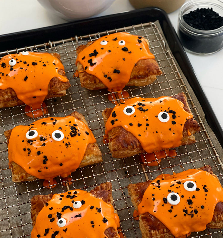 Spooky Strawberry Pop Tarts with Cardamom Cream Cheese Icing