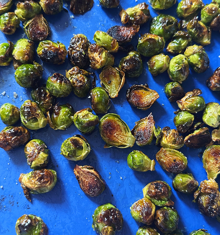 Roasted Brussels Sprouts with Apples, Pickled Shallots, Hazelnuts, and Cheddar Cheese